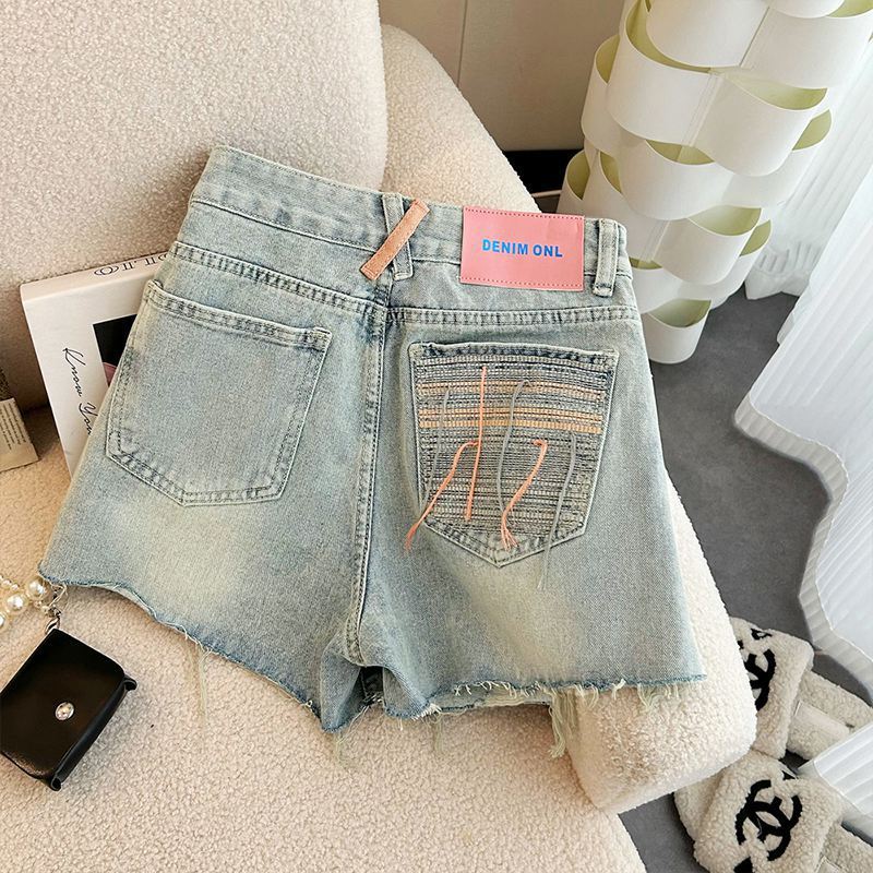 Shorts de mezclilla anchos rasgados