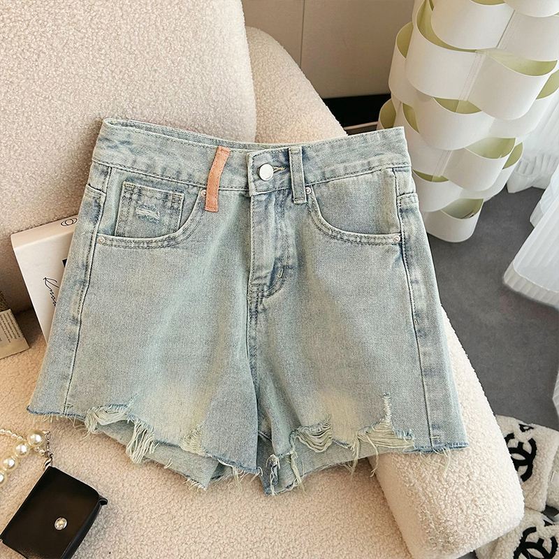 Shorts de mezclilla anchos rasgados