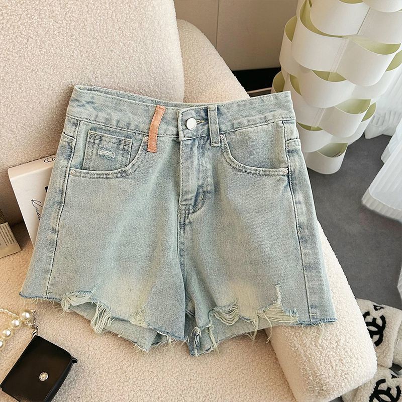Shorts de mezclilla anchos rasgados