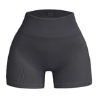 Pantalones cortos de punto acanalados para mujer, shorts de yoga sin costuras, shorts elásticos de cintura alta, shorts sexys para realzar la cadera, pantalones de tres cuartos para ciclismo y running.