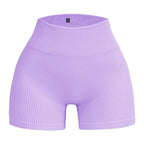 Pantalones cortos de punto acanalados para mujer, shorts de yoga sin costuras, shorts elásticos de cintura alta, shorts sexys para realzar la cadera, pantalones de tres cuartos para ciclismo y running.