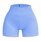 Pantalones cortos de punto acanalados para mujer, shorts de yoga sin costuras, shorts elásticos de cintura alta, shorts sexys para realzar la cadera, pantalones de tres cuartos para ciclismo y running.