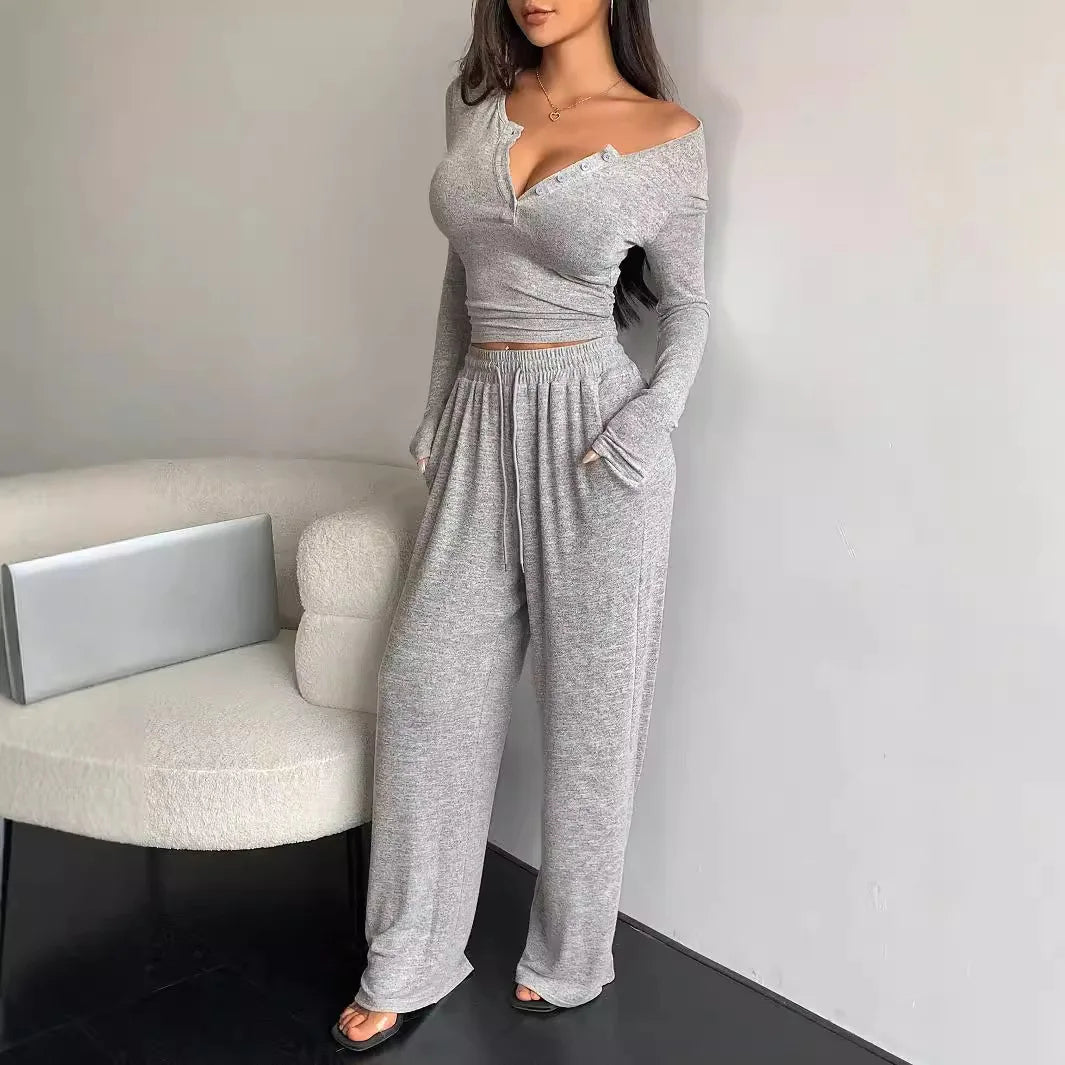 Traje informal de dos piezas para mujer: top de manga larga con botones de color liso y pantalones de pierna ancha con bolsillos y cordón, para primavera/verano.