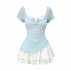 Top Henley de manga corta + Minifalda de volantes superpuestos