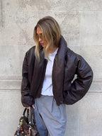 Chaqueta acolchada de piel sintética elegante para mujer, a la moda, con cuello alto, cremallera, corta, de PU, para mujer, otoño-invierno 2025, ropa de abrigo informal