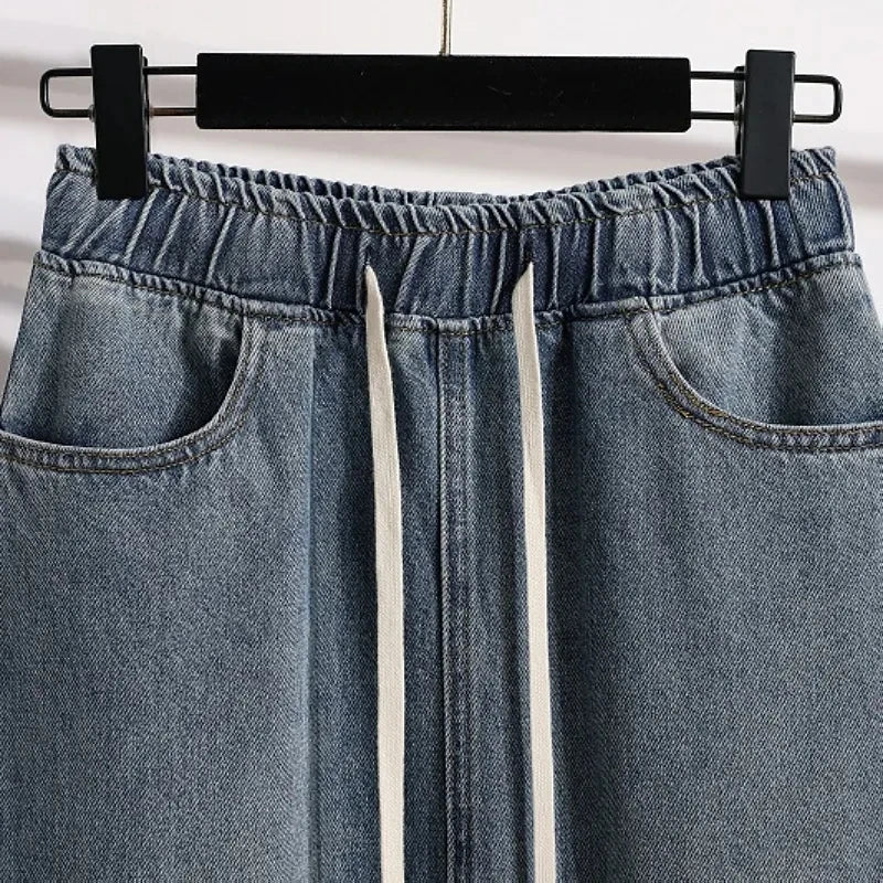 Primavera/Verano 2026Nueva falda vaquera con cordón en la cintura elástica y abertura, de talle alto, estilo retro y corte A informal para mujer