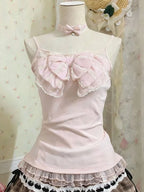 Cárdigan de encaje + Top camisola + Minifalda a cuadros