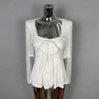 Conjunto de top de tirantes con lazo y cárdigan corto liso elegante