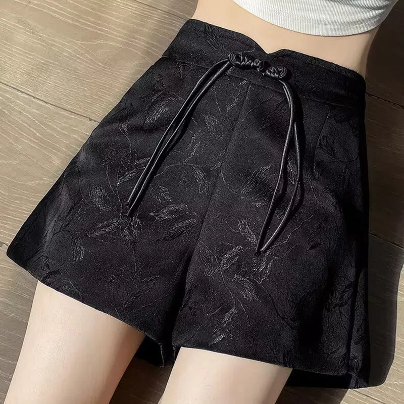 Pantalones cortos de satén jacquard con borlas