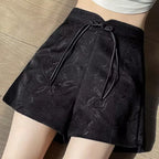 Pantalones cortos de satén jacquard con borlas