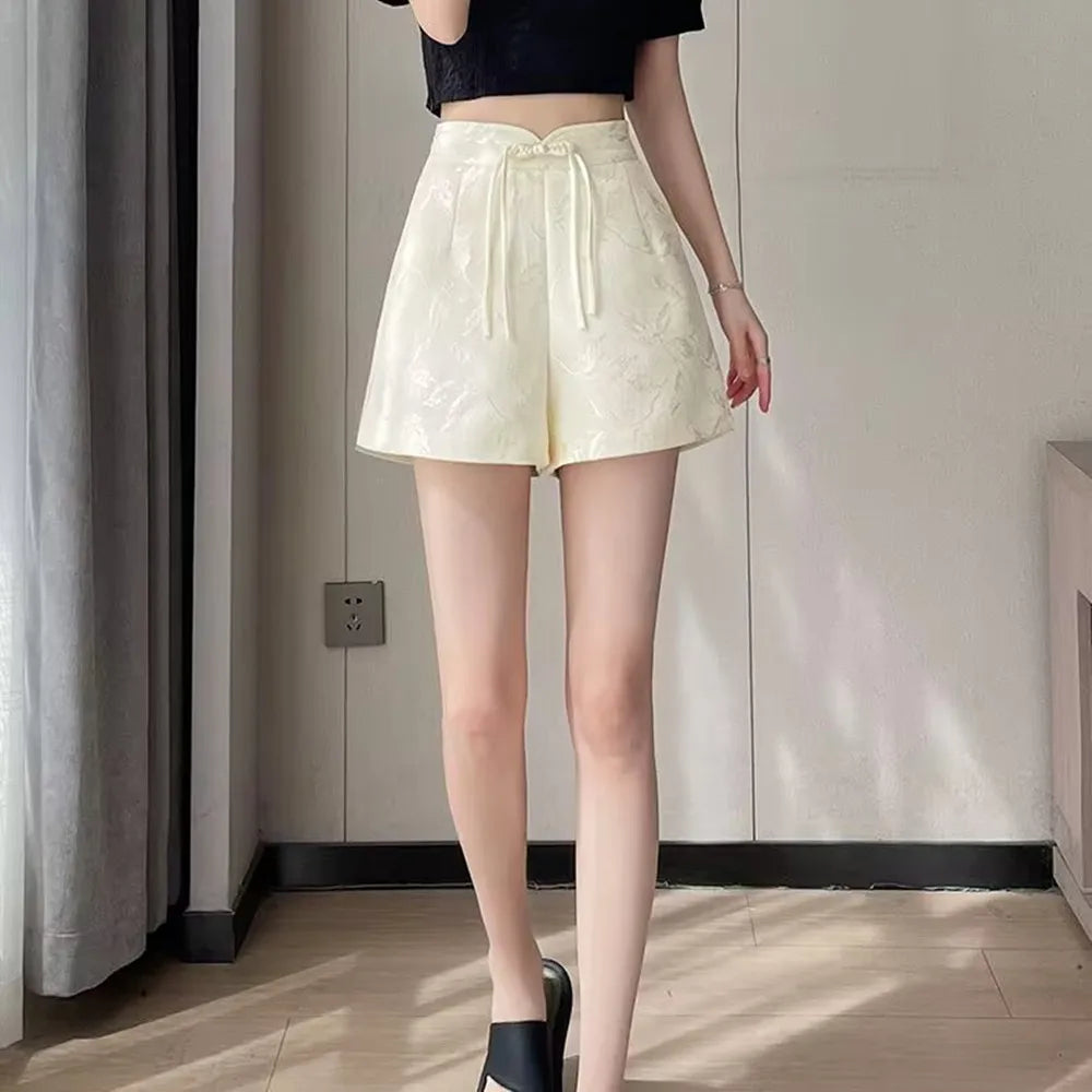 Pantalones cortos de satén jacquard con borlas