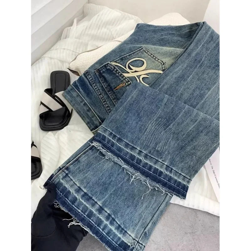 Jeans americanos retro de tiro bajo para mujer, otoño, nueva moda, bordado, temperamento, casual, ajustado, acampanado, estilo comodín.