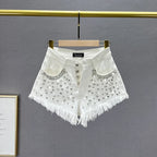 Pantalones cortos de mezclilla con incrustaciones de diamantes
