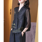 Blusa asimétrica vintage de seda bordada