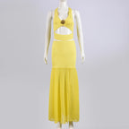 Conjunto de top corto con cuello halter y falda midi maxi con abertura lateral