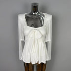 Conjunto de top de tirantes con lazo y cárdigan corto liso elegante