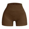 Pantalones cortos de punto acanalados para mujer, shorts de yoga sin costuras, shorts elásticos de cintura alta, shorts sexys para realzar la cadera, pantalones de tres cuartos para ciclismo y running.
